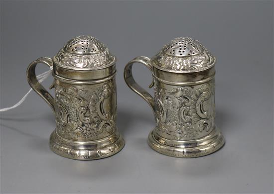 A pair of late Victorian silver kitchen peppers, George Gillet, London, 1894, 71mm.